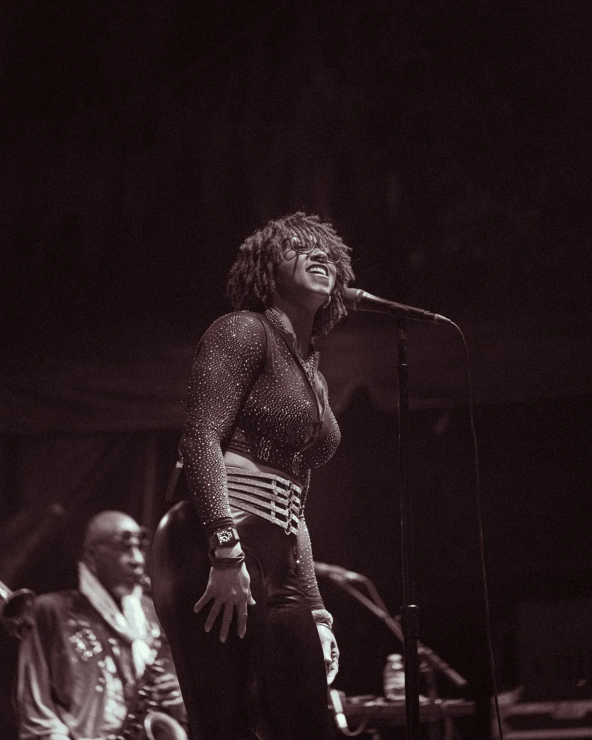 Don Was performing energetically at microphone during Fort Mose Jazz Festival in St. Augustine, Florida