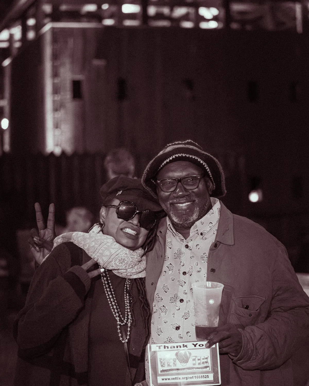 Two smiling festival performers posing together at Fort Mose Jazz Festival in St. Augustine, Florida