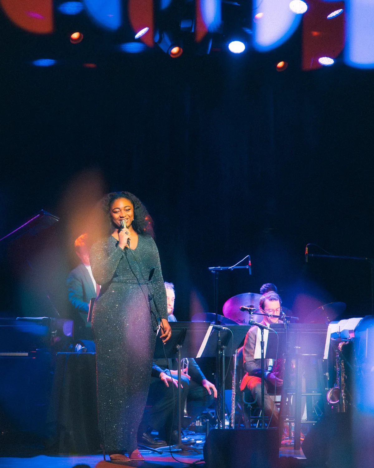 Samara Joy performs on stage with live band at Fort Mose Jazz Festival in St. Augustine, Florida