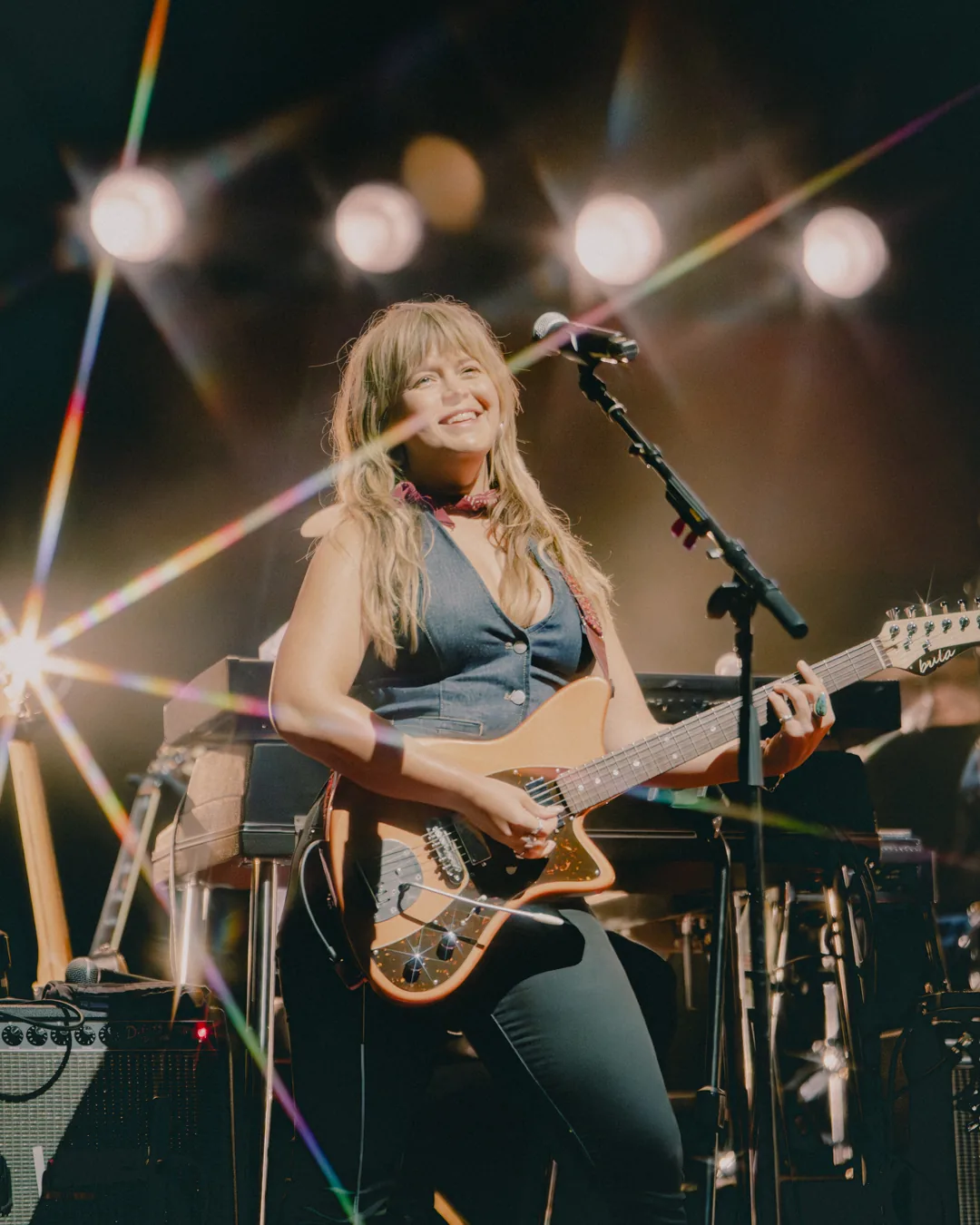 Female guitarist performing at St. Augustine Amphitheatre