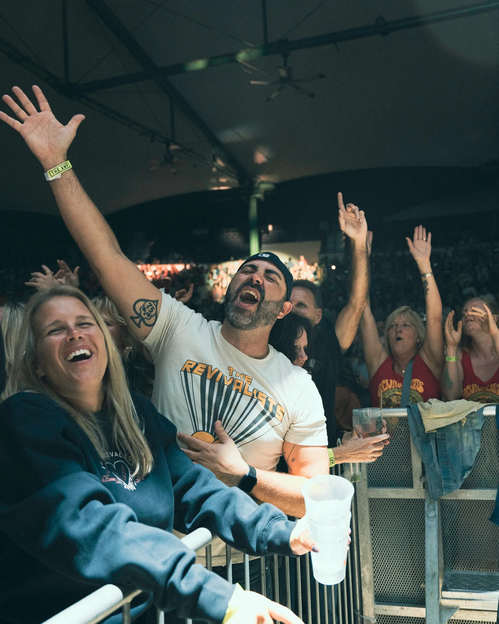 Excited fans cheering at The Revivalists concert at St. Augustine Amphitheatre - event video production by First Sight Films